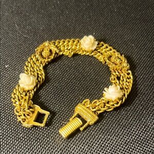 Elegant Gold Bracelet with Floral Accents;vintage( circa 1959);signed